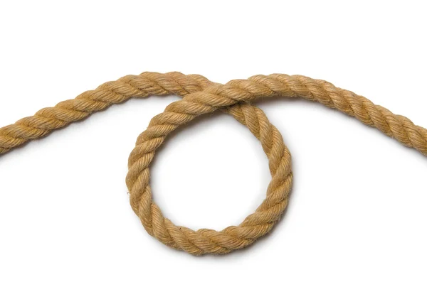 Концепция с длинной конопляной веревкой — стоковое фото