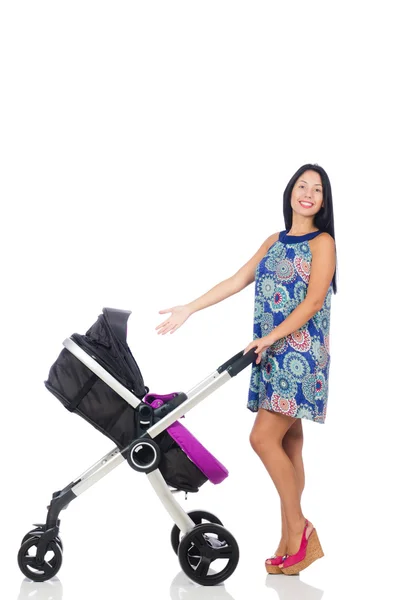 Happy mom with her baby in pram — Stock Photo, Image