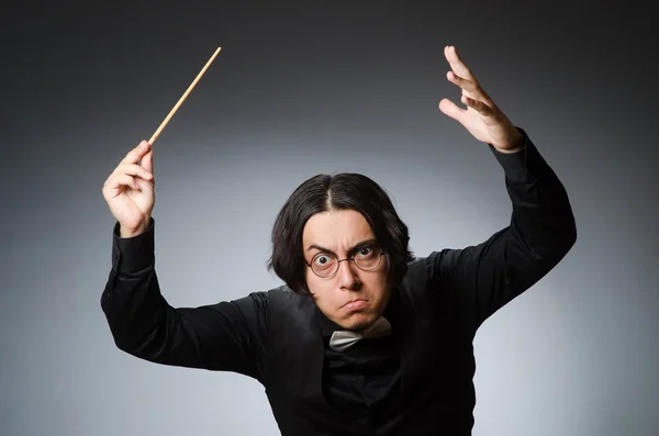 Funny conductor in musical concept — Stock Photo, Image