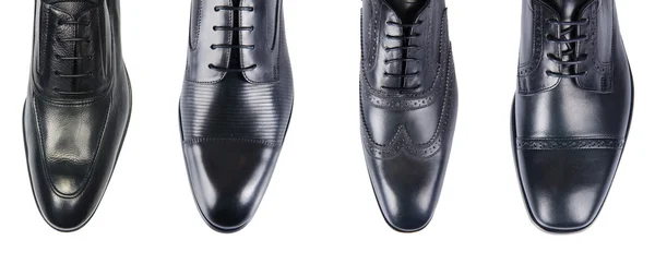 Выбор мужской обуви изолированы на белом — стоковое фото
