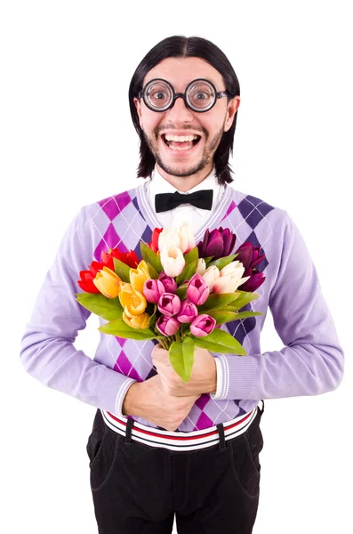 Hombre sosteniendo tulipanes aislados en blanco — Foto de Stock