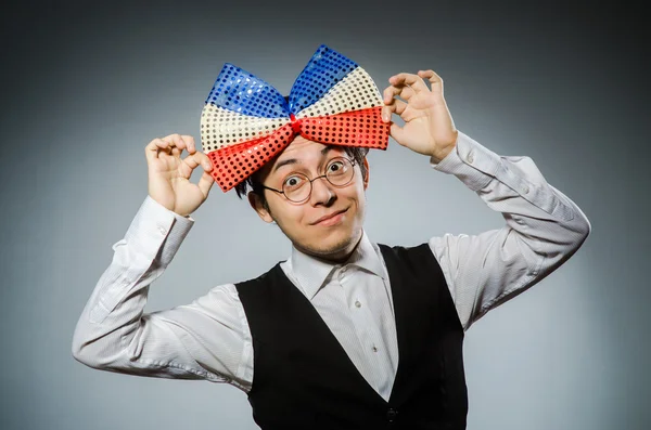 Funny man with giant bow tie — Stock Photo, Image