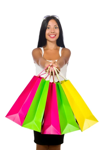 Žena s nákupní tašky na bílém — Stock fotografie
