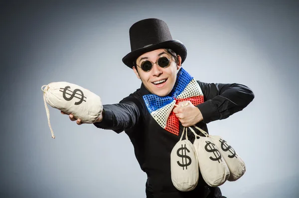 Funny man with money dollar sacks — Stock Photo, Image