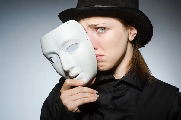Woman with mask in funny concept — Stock Photo, Image
