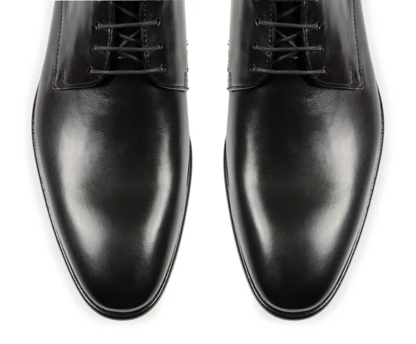 Punta de zapatos masculinos aislados en blanco —  Fotos de Stock