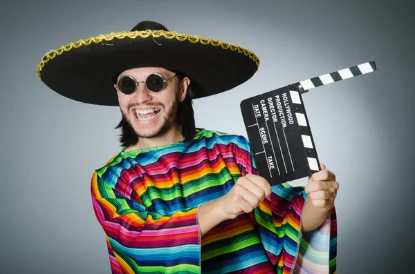 Mexican man with movie board — Stock Photo, Image