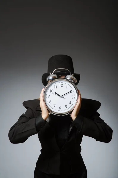 Woman with clock in business concept — Stock Photo, Image