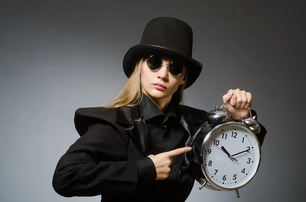 Woman with clock in business concept — Stock Photo, Image