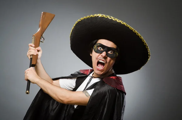 Person som bär sombrero hatt i roligt koncept — Stockfoto