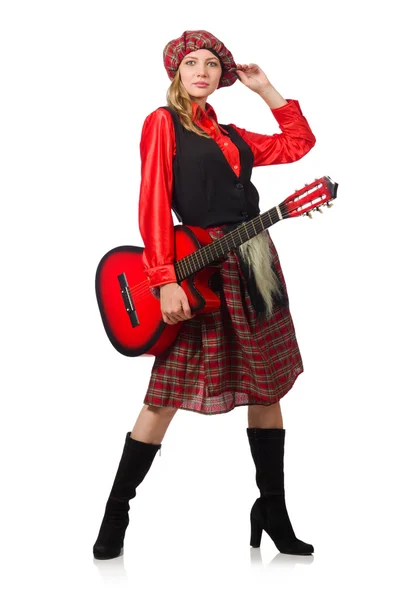 Mulher engraçada em roupas escocesas com guitarra — Fotografia de Stock