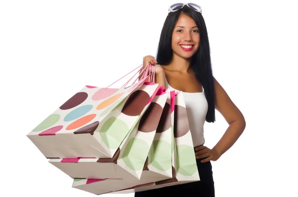 Женщина с пакетами на белом — стоковое фото
