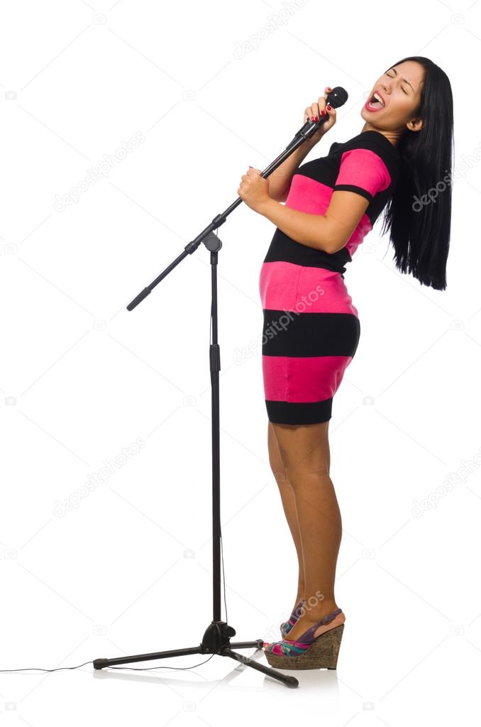 Woman singing in karaoke club on white