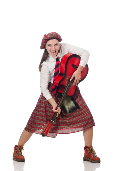 Женщина в шотландской одежде с гитарой — стоковое фото