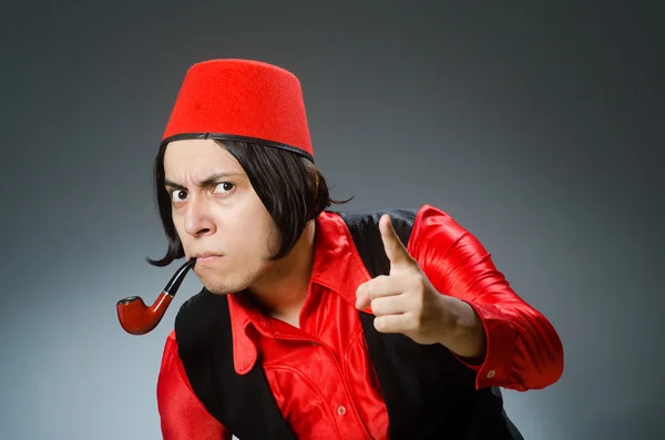 Man wearing red fez hat — Stock Photo, Image