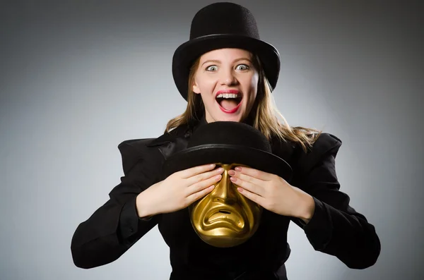 Woman with mask in funny concept — Stock Photo, Image