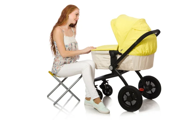 Жінка з дитиною і коляскою ізольовані на білому — стокове фото