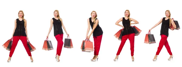 Ensemble de femme avec sacs à provisions sur blanc — Photo