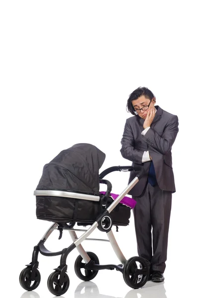 Zabawny tata z dzieckiem i wózkiem dziecięcym na białym — Zdjęcie stockowe