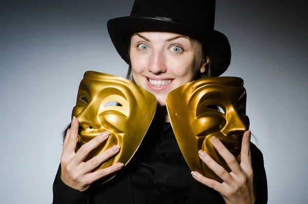 Woman with mask in funny concept Stock Photo