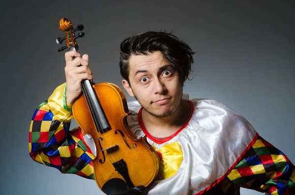 Funny violin clown player in musical concept — Stock Photo, Image