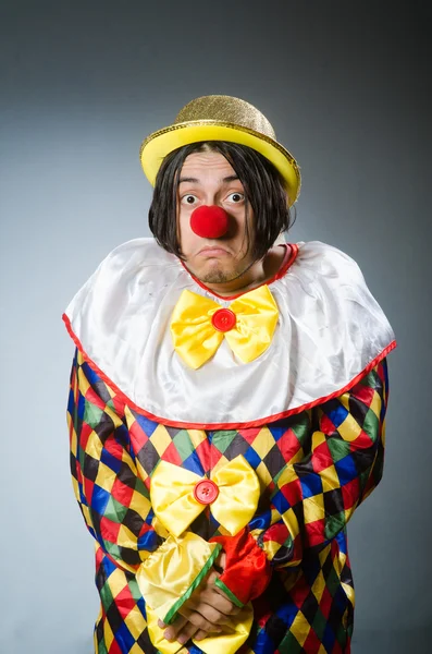 Funny clown against dark background — Stock Photo, Image