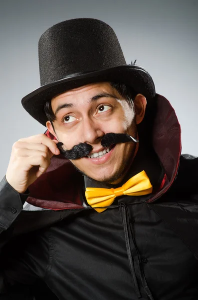 Funny magician man wearing tophat — Stock Photo, Image