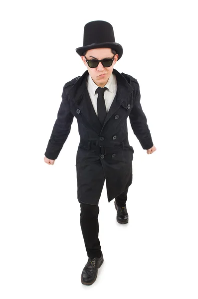 Young detective in black coat isolated on white — Stock Photo, Image