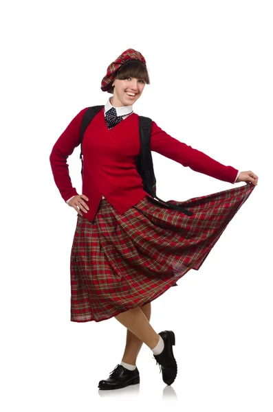 Meisje in Schotse tartan kleding op wit wordt geïsoleerd — Stockfoto