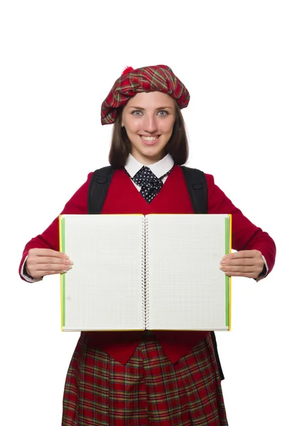 Meisje in Schotse tartan kleding op wit wordt geïsoleerd — Stockfoto