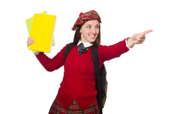 Meisje in Schotse tartan kleding op wit wordt geïsoleerd — Stockfoto