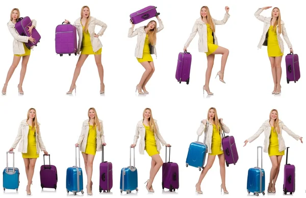 Mulher se preparando para férias com mala em branco — Fotografia de Stock