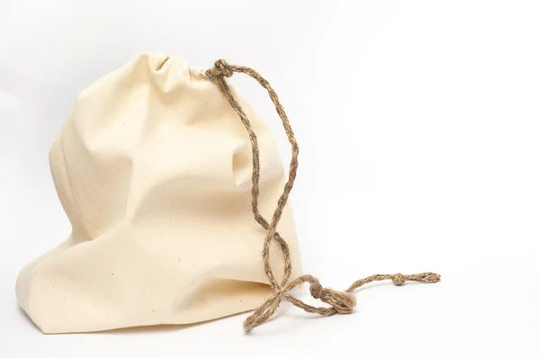 Маленька біла сумка з тканини, ручної роботи — стокове фото