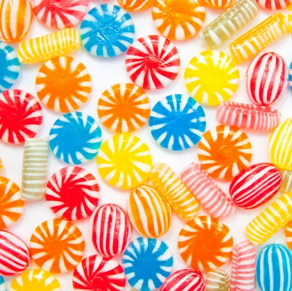 Many differnt tasty candies on white — Stock Photo, Image