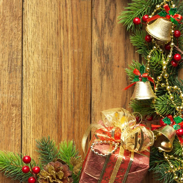 Decorated Christmas tree border on wood paneling — Stock Photo ...