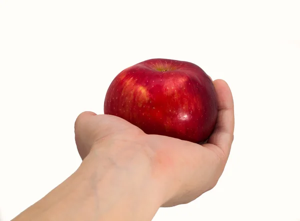 Jabłko w rękę na białym tle — Zdjęcie stockowe