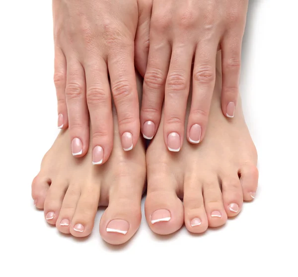 Mooie vrouwelijke voeten op spa salon — Stockfoto
