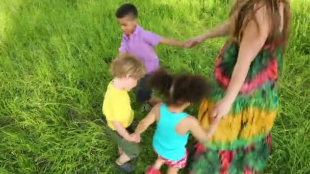 Girl  and three kids dancing — Stock Video