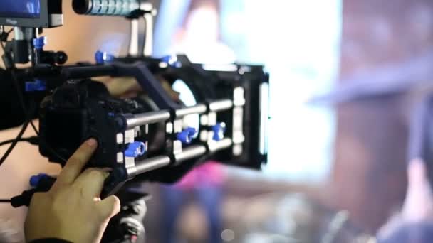 Camcorder works in studio shooting scene — Stock Video