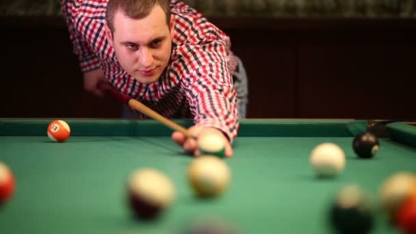 Man  playing pool in billiard hall — Stock Video