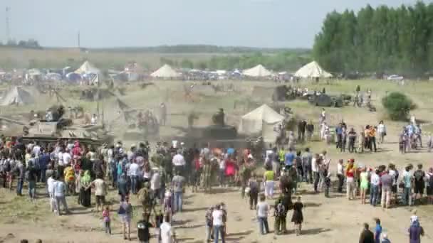 Spectators watch the military equipment — Stock Video