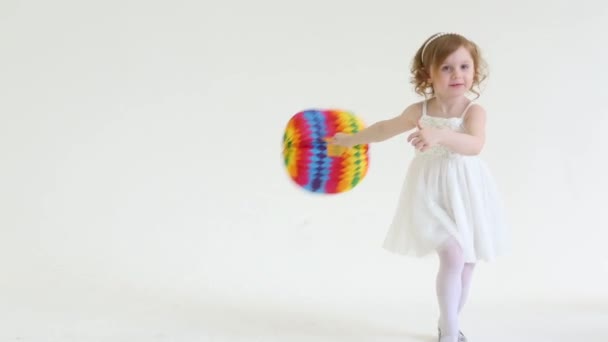 Little smiling girl  with bright bag — Stock Video