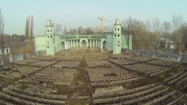 Rows of seats in neglected theatre — Stock Video