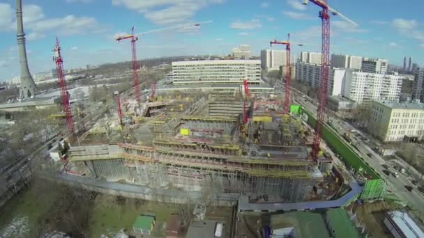 Construction site  near TV tower — Stock Video