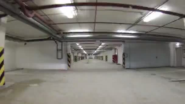 Movement on empty spacious indoor parking — Stock Video