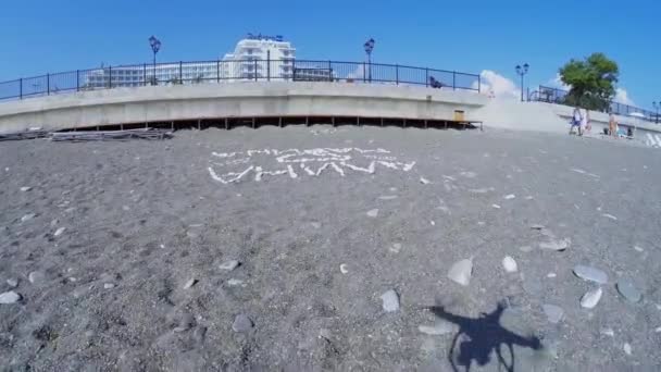 Love words on pebble beach — Stock videók