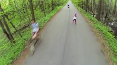 Little girl ride on rollerskates