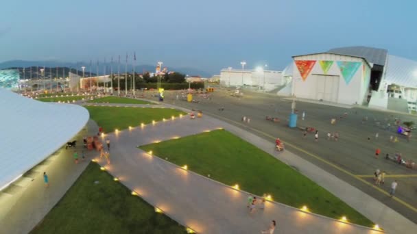 Square with fountain and sports stadiums — стокове відео