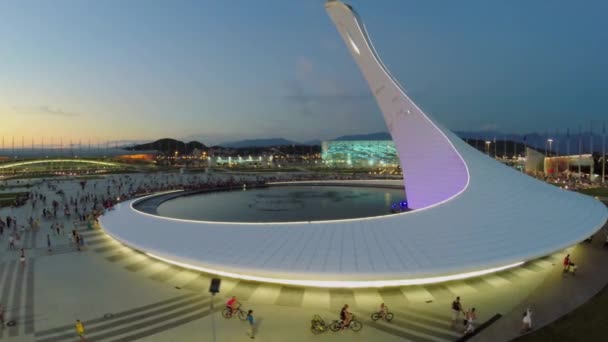 Square with fountain and sports stadiums — Stockvideo
