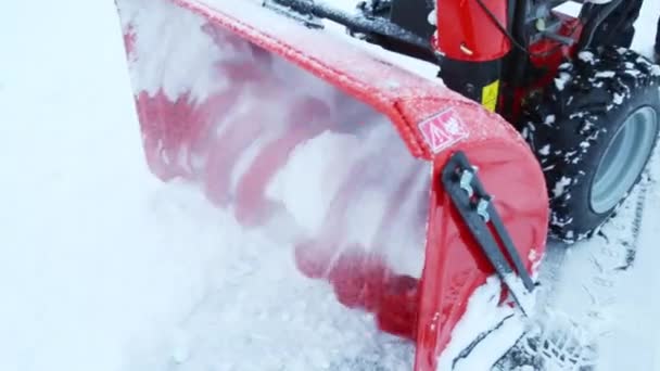 Rotating blades of working snowblower — Stock Video